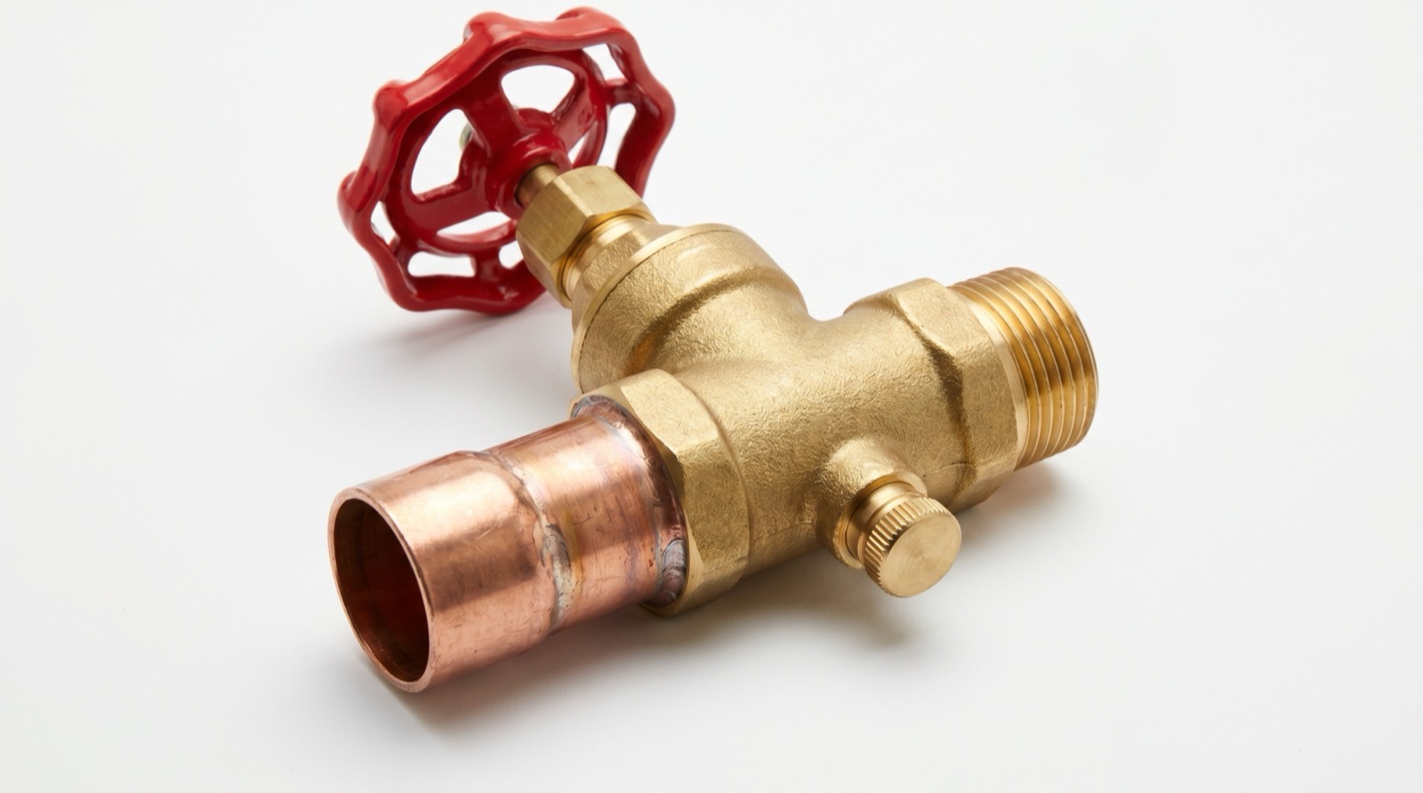 Mark Johnson & Sons Plumbing technician replacing a stop and waste valve on a North Louisiana home water line